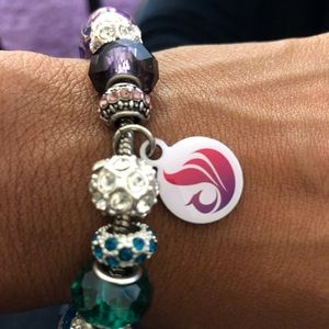 H.A.A. Charm bracelets.